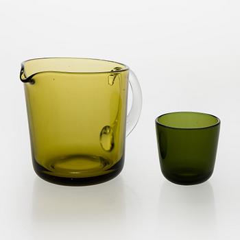 Kaj Franck, a mid-20th century "5601" glass pitcher and a twelve "5023" glasses, Nuutajärvi, Finland.