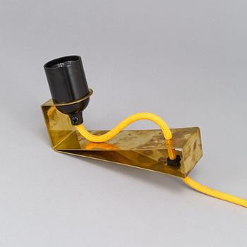 ANDREAS MARTIN-LÖF, a prototype of "Clamp Lamp , Studio Item No 01", by AML Studio 2009.