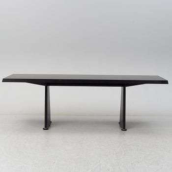 A 'Trapeze' dinner table by Jean Prouvé, Vitra, 2002.