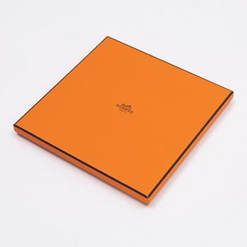 Hermès, a 'Horscars' silk scarf.