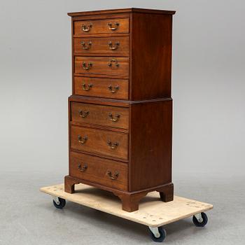A mahogany 'Tallboy' chest of drawers.