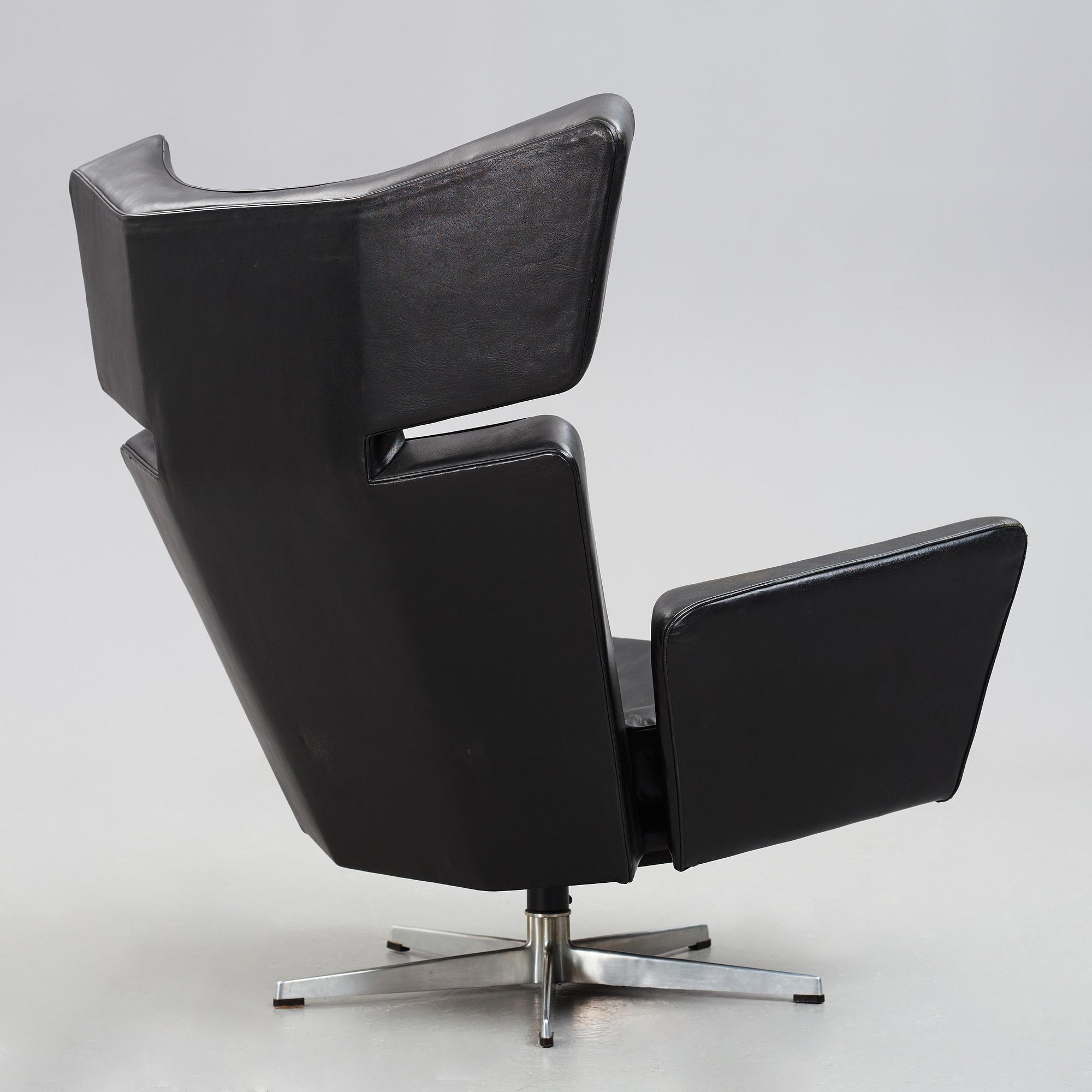 Arne Jacobsen, a black leather and aluminium "Ox-Chair", Denmark 1966.