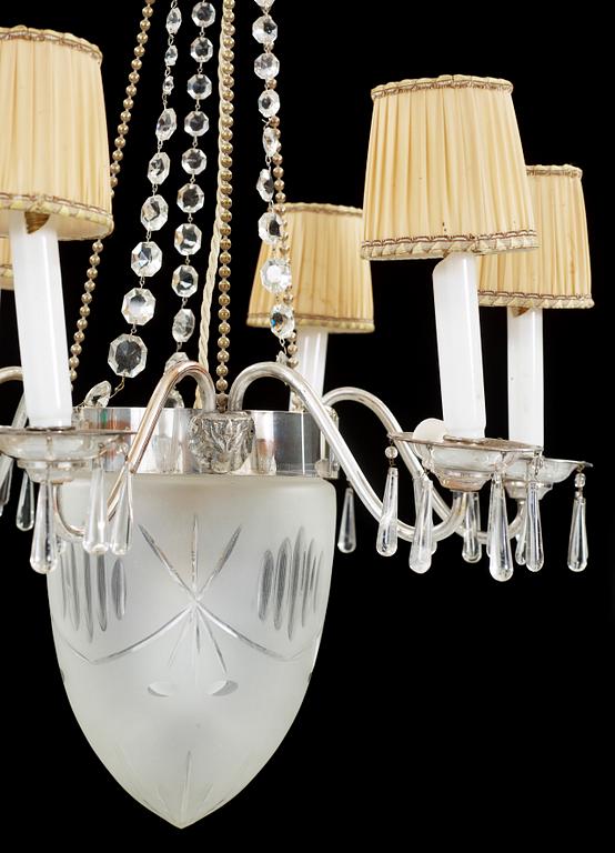 TAKKRONA, nysilver, 1920/30-tal. Höjd ca 80 cm.