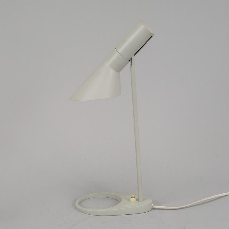 Arne Jacobsen, an 'AJ' grey lacquered table lamp, probably Axel Annell on license by Louis Poulsen, Denmark.