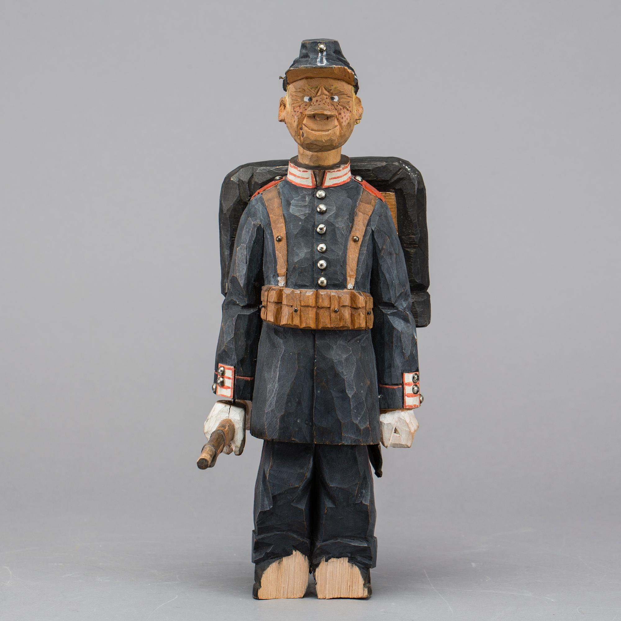 TWO WOOD SCULPTURES, one signed Axel Ericsson.