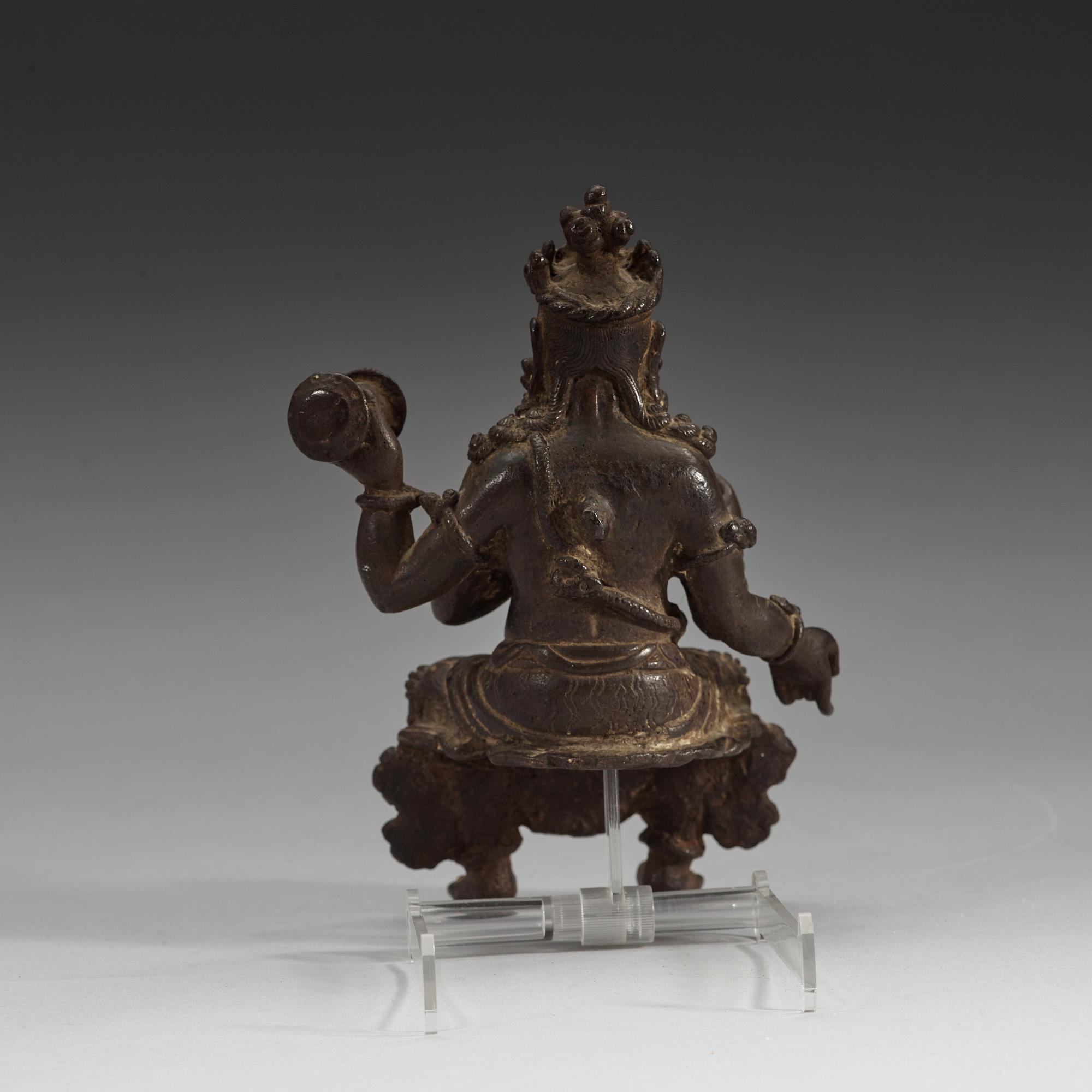 A seated bronze figurine of Mahakala, 15/16th Century or earlier.