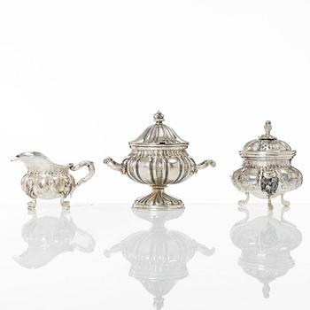 A silver sugar bowl and a set with creamer and sugar bowl, silver, 20th century.