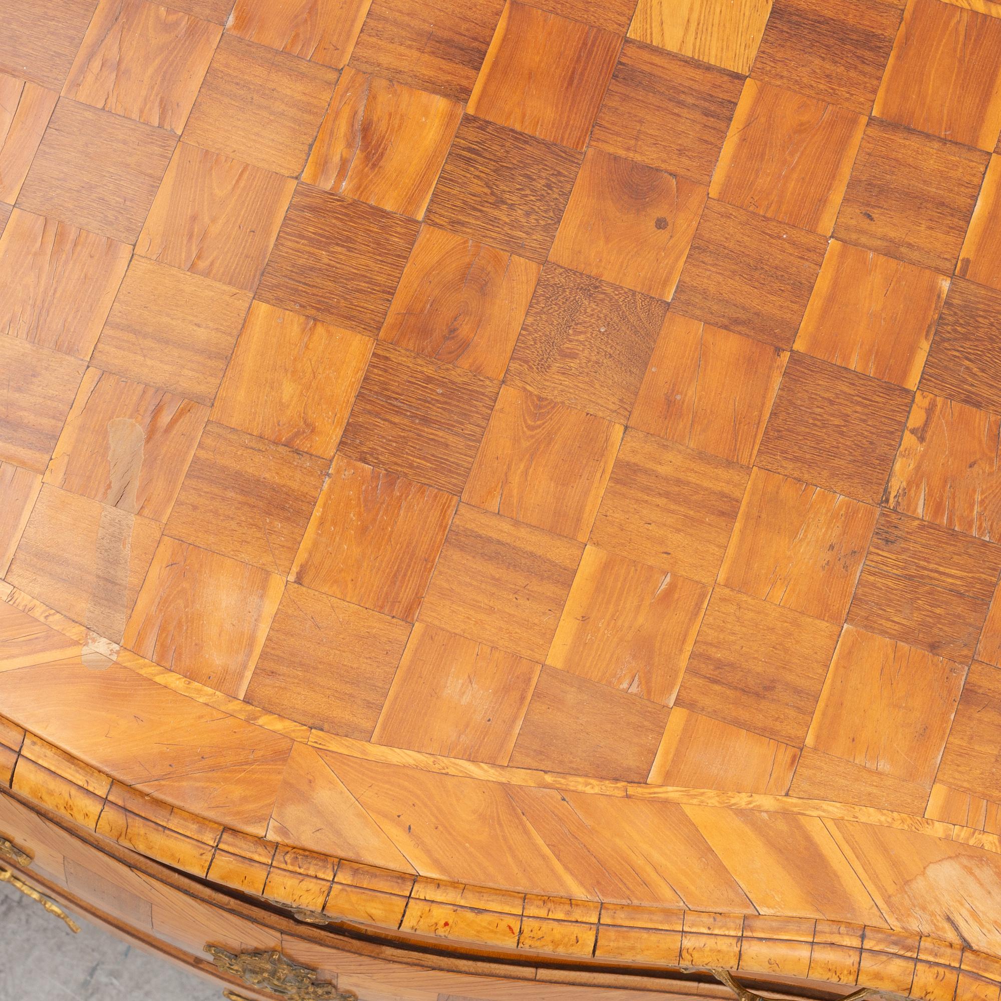 A Swedish rococo parquetry commode, later part 18th century.