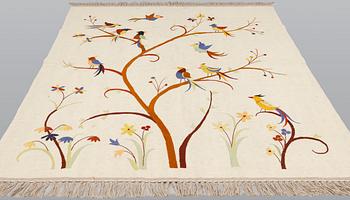 An embroided oriental flat weave carpet, circa 225 x 175 cm.