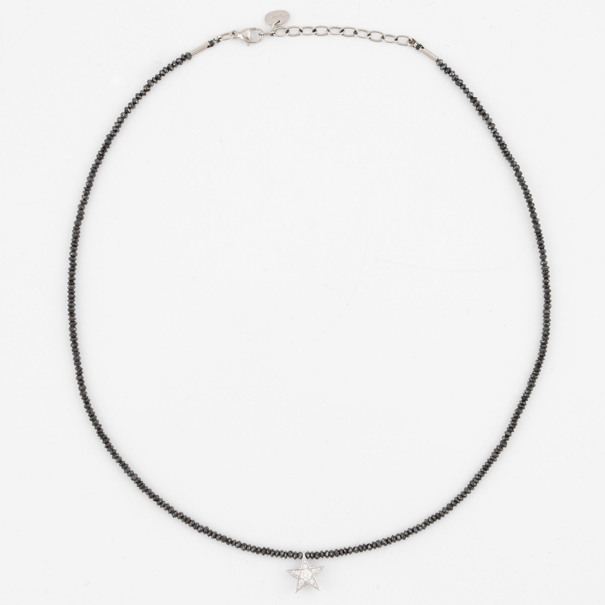 Necklace, Atelier Ajour, black diamonds with a star pendant set with brilliant-cut diamonds.