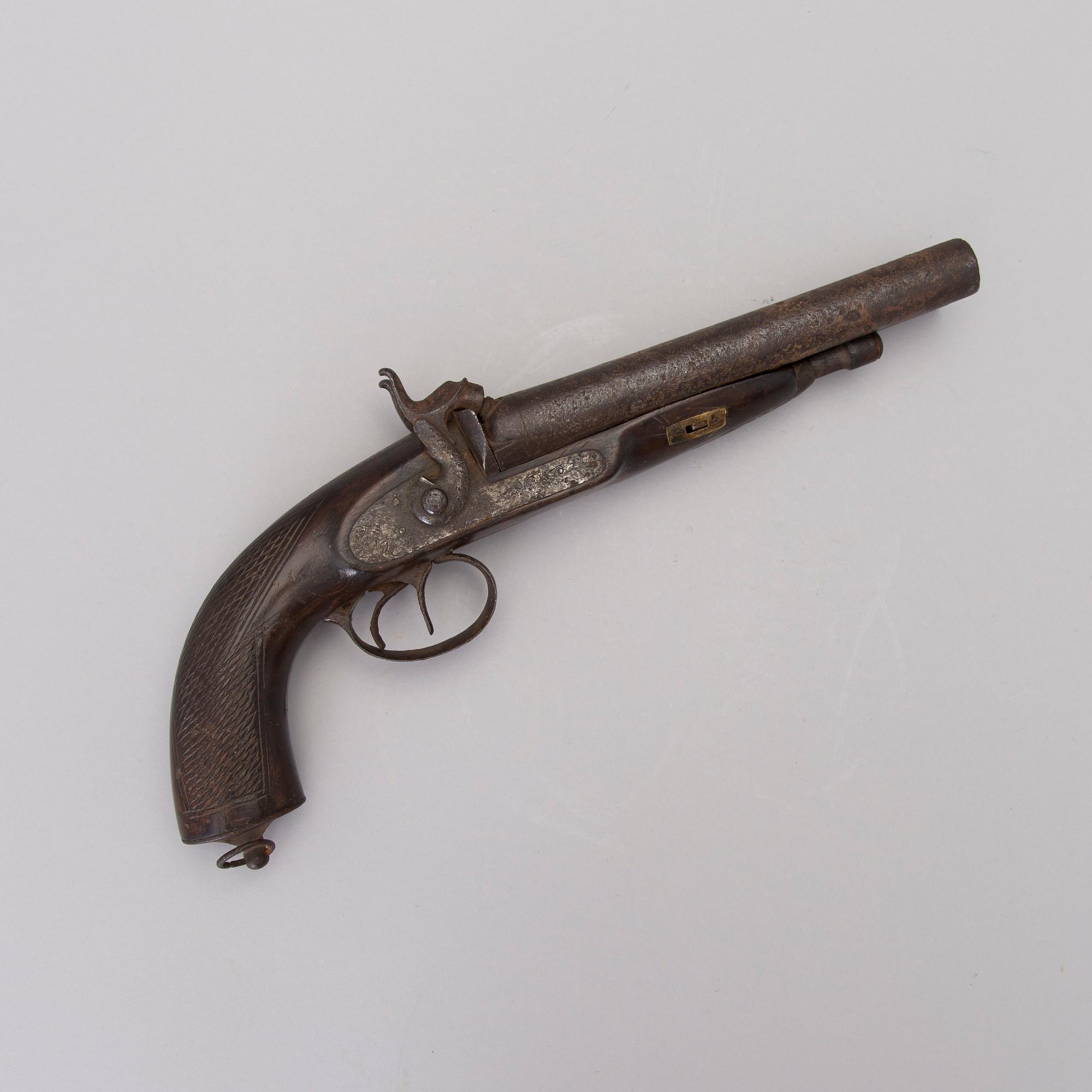 A Central European percussion lock pistol from the first half of the 19th century.