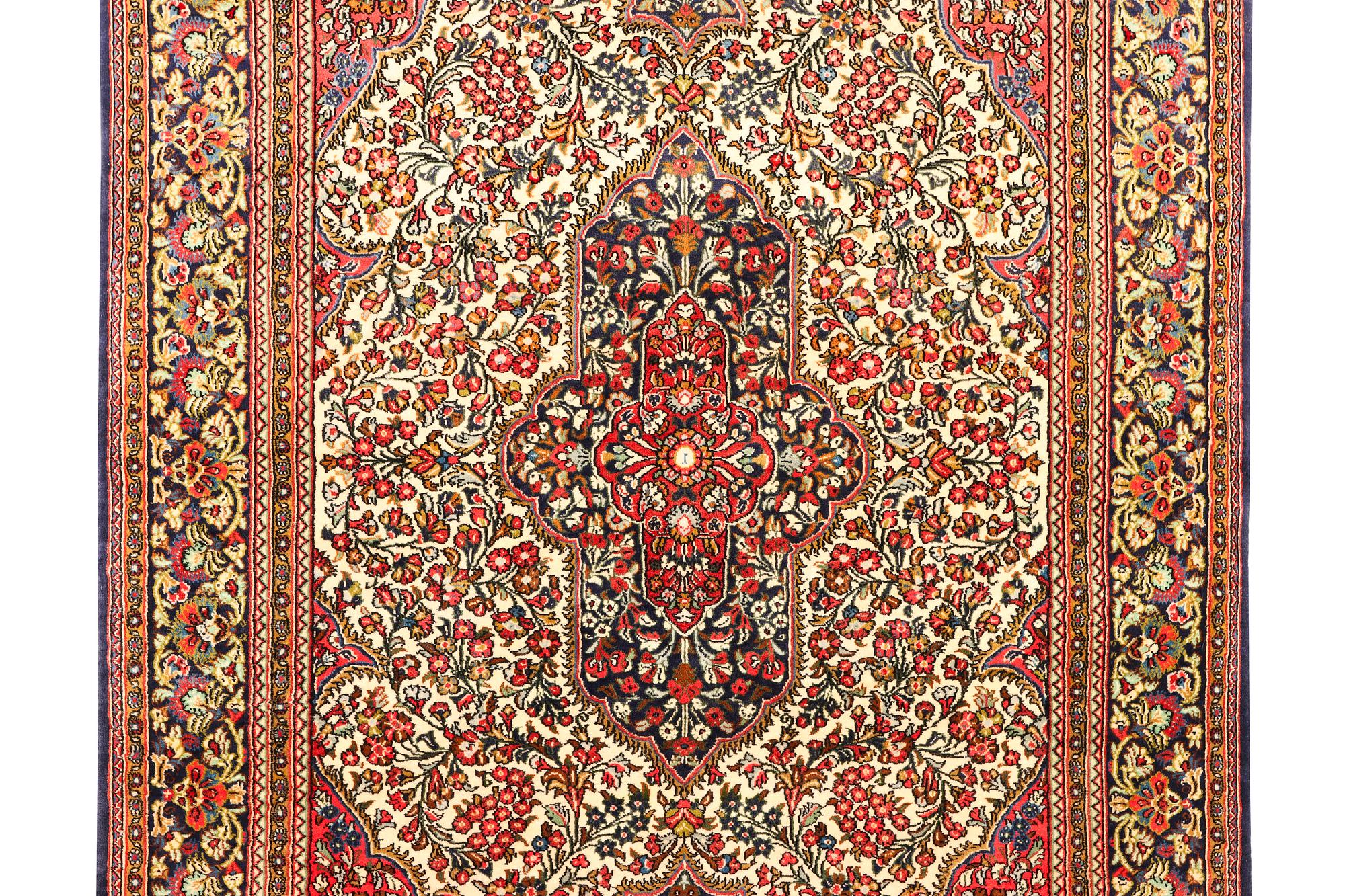 A Ghom rug, c. 202 x 137 cm.