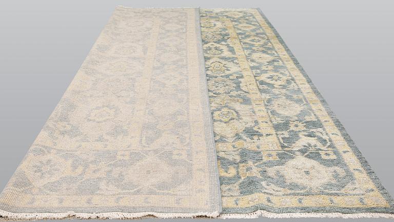 An oriental carpet, ca 425 x 300 cm.