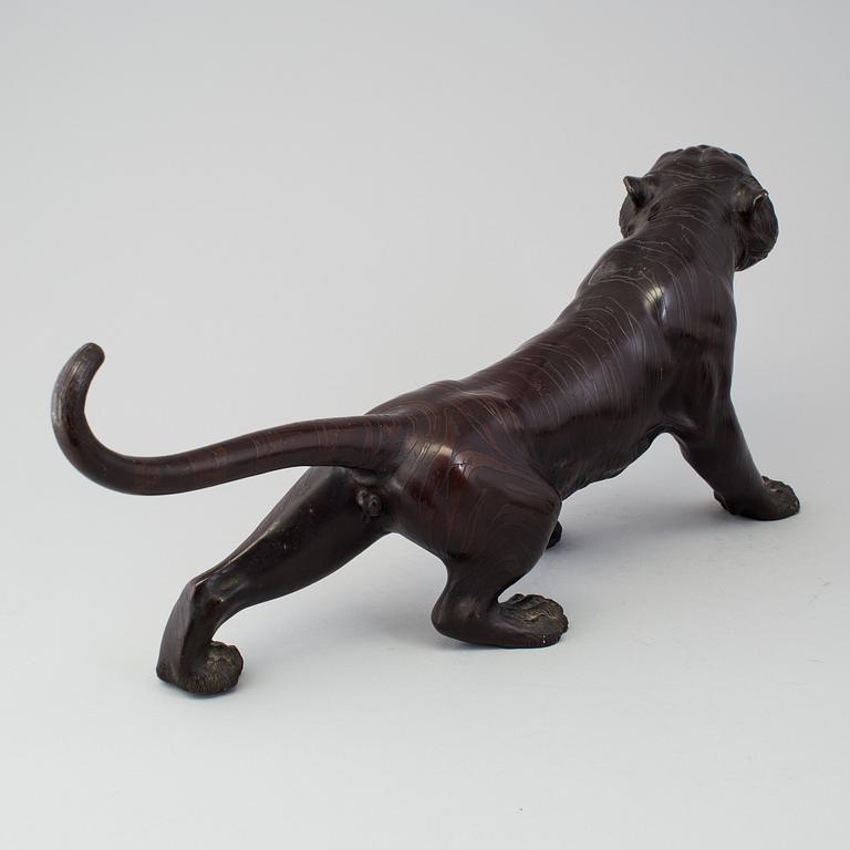 A Japanse bronze tiger, 20th Century. With makers mark.