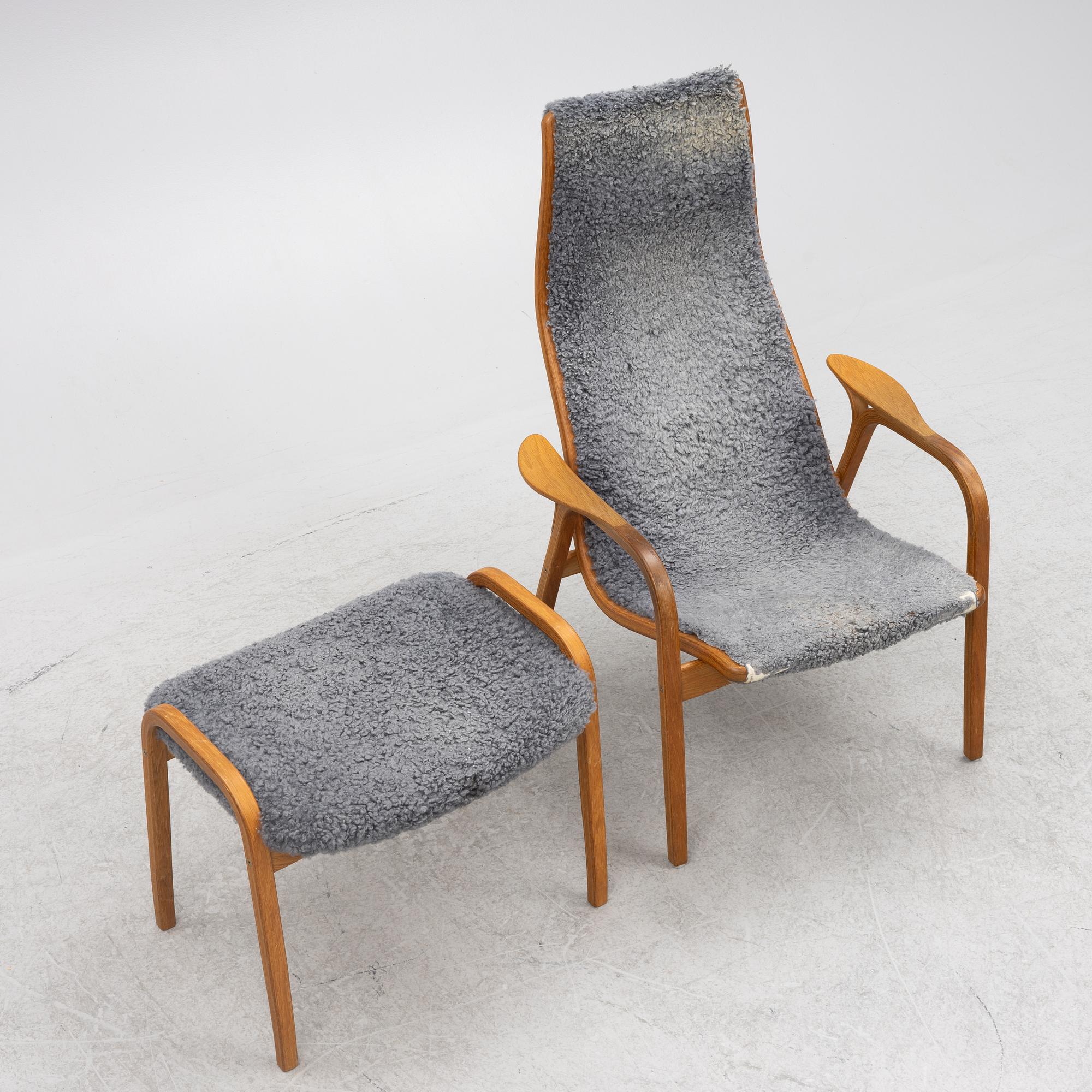 Yngve Ekström, a "Lamino" armchair with ottoman, Swedese, Sweden, late 20th century.