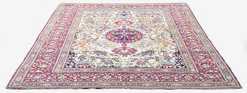 An antique Isfahan rug, Central Persia, c. 219 x 143 cm.