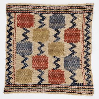 Märta Måås-Fjetterström, a textile, "Skaftblomman", flat weave, c 38 x 37 cm, signed MMF.