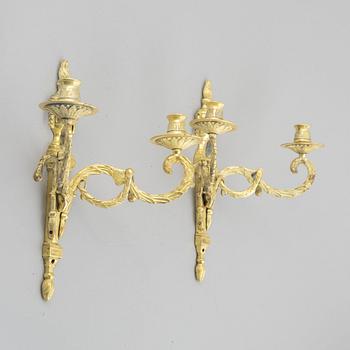 A pair of early 20th century Louis XVI-style wall sconces.