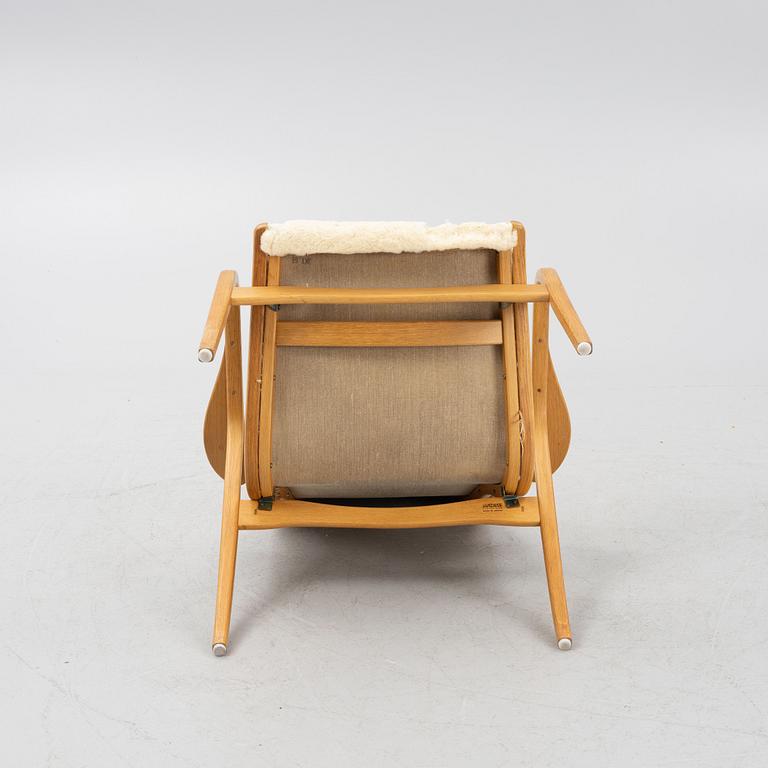 Yngve Ekström, a "Lamino" armchair, Swedese.