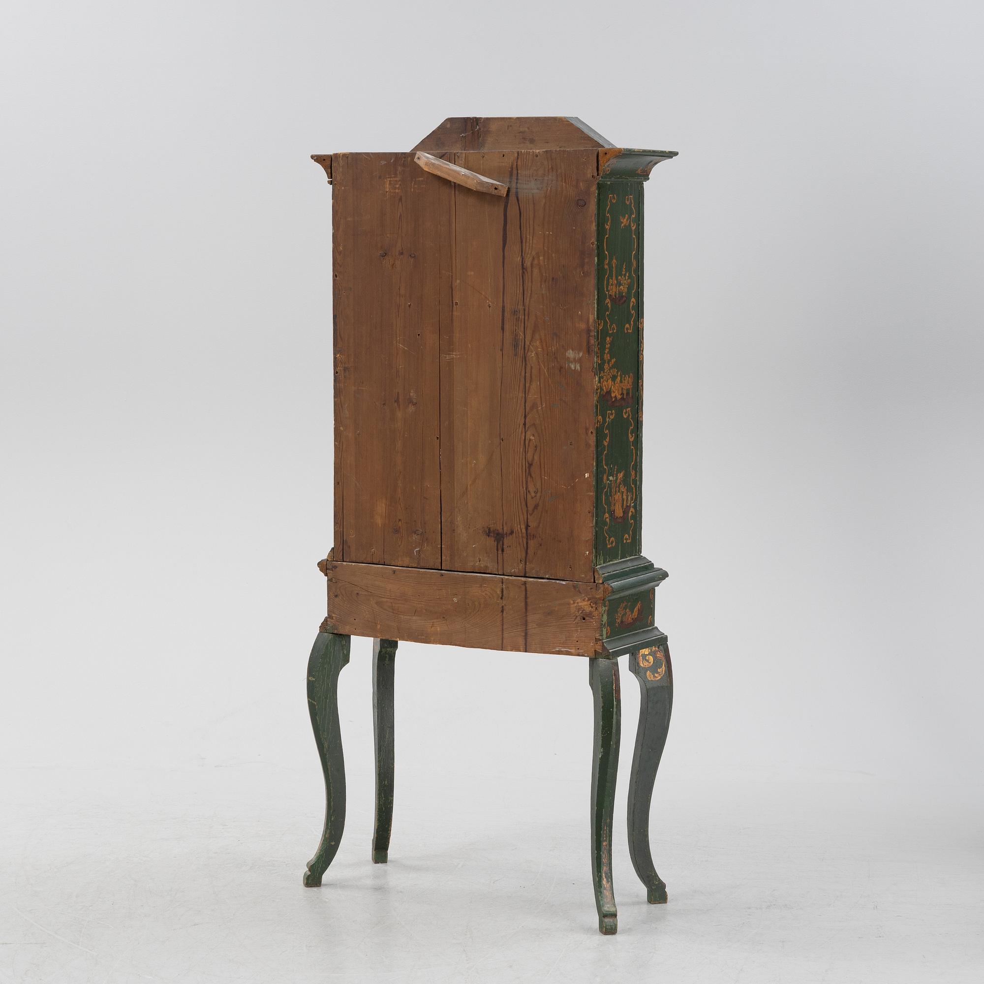 An 18th century cabinet / doll's house.