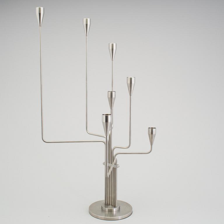 PIET HEIN, a stainless steel candelabrum, 21st Century.