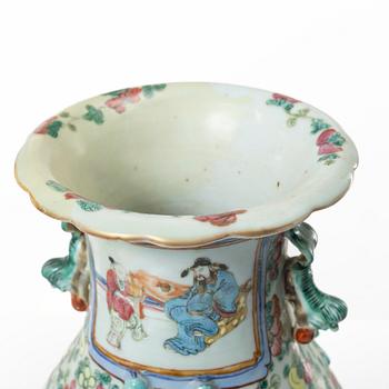 A group of three famille rose vases, Qing dynasty, late 19th century.