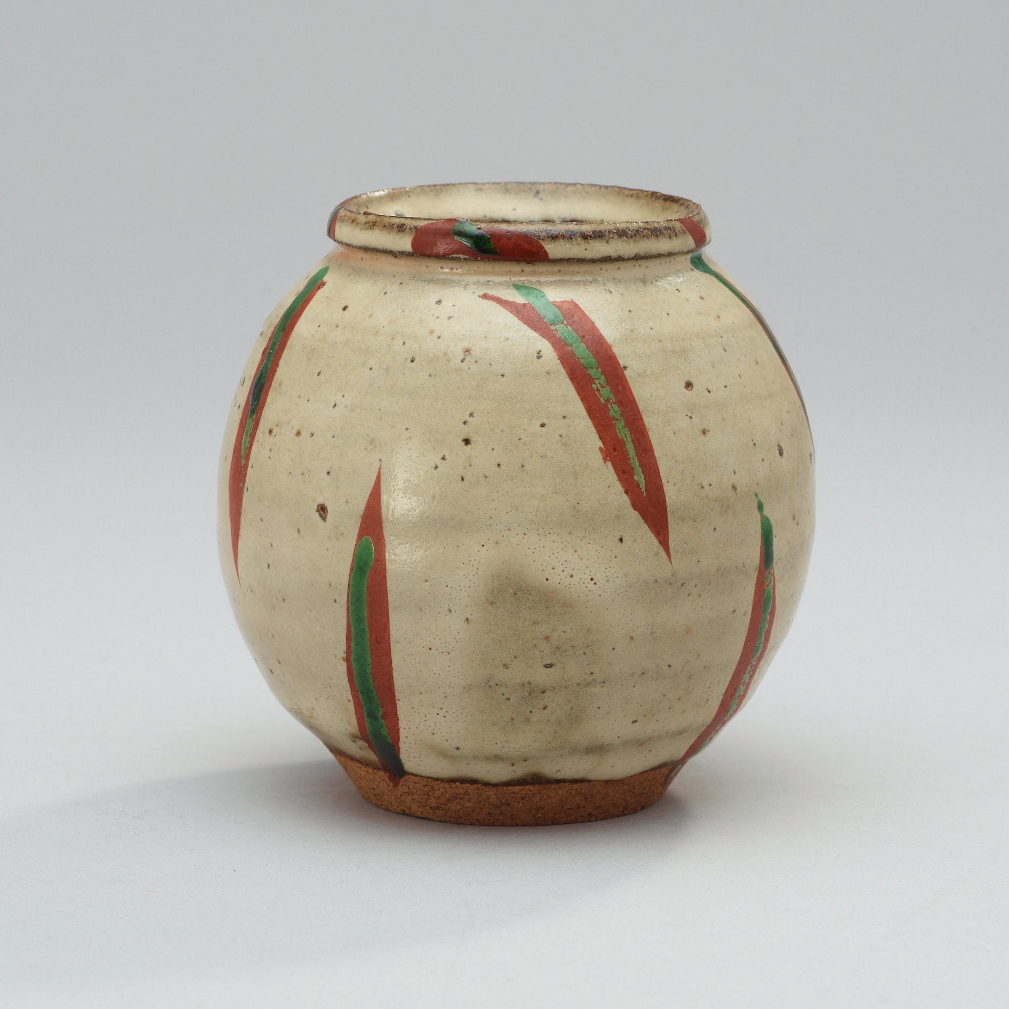 A Japanese stoneware jar, attributed to Wakao Toshisada.