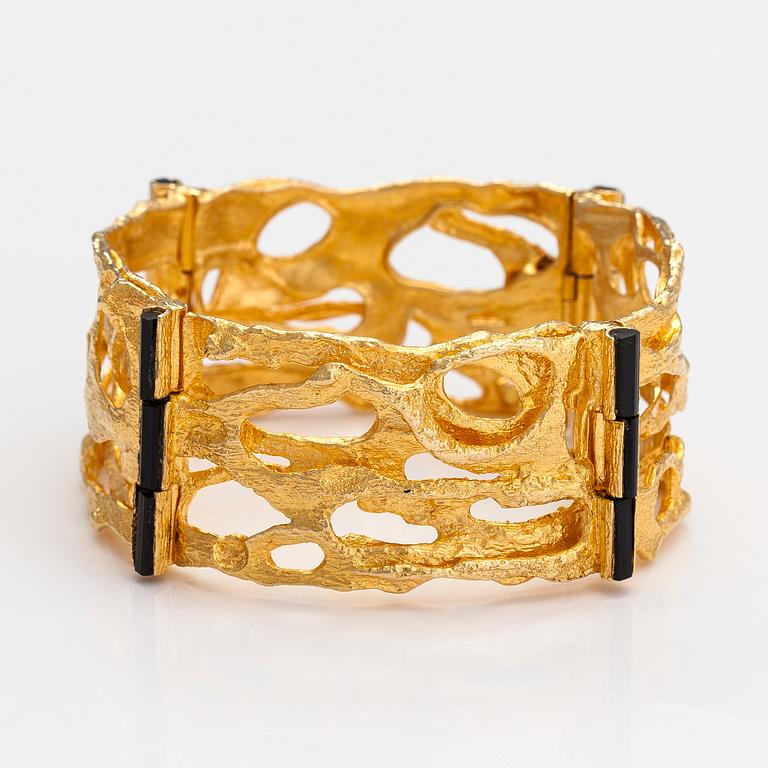 Björn Weckström, "Sacrificial fire", An 18K gold and tourmaline bracelet. Lapponia 1971.