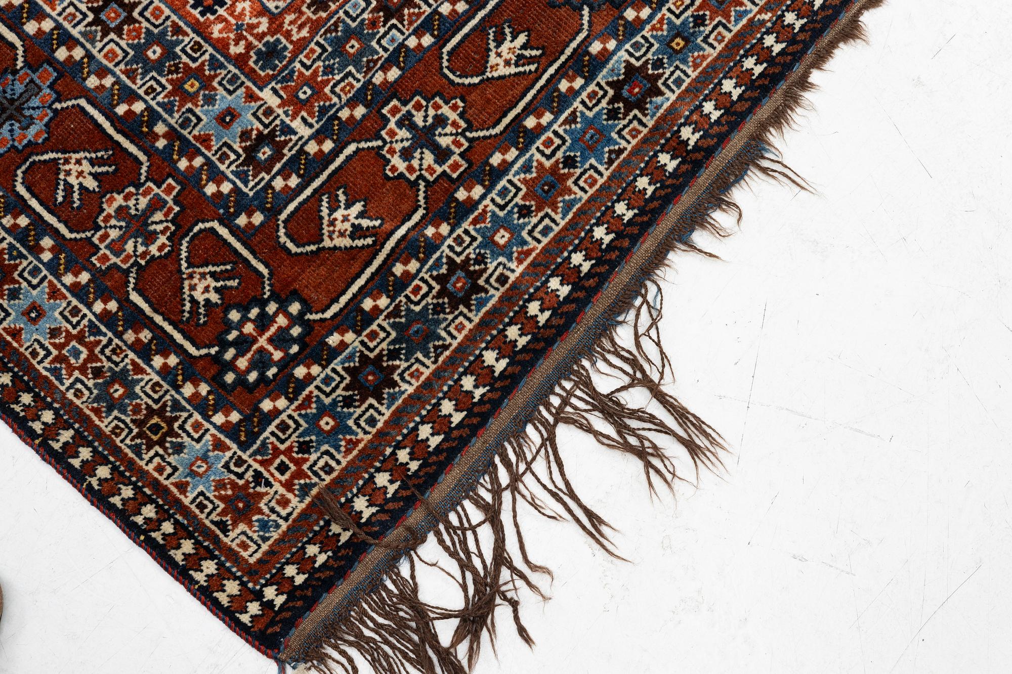 A carpet, Qashkai 'Shekarlou', approx. 310 x 227 cm.