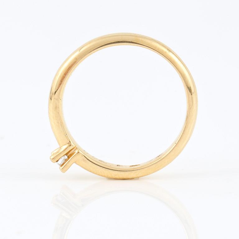 RING, Sverige, 18K guldband med diamant ca 0.05ct.