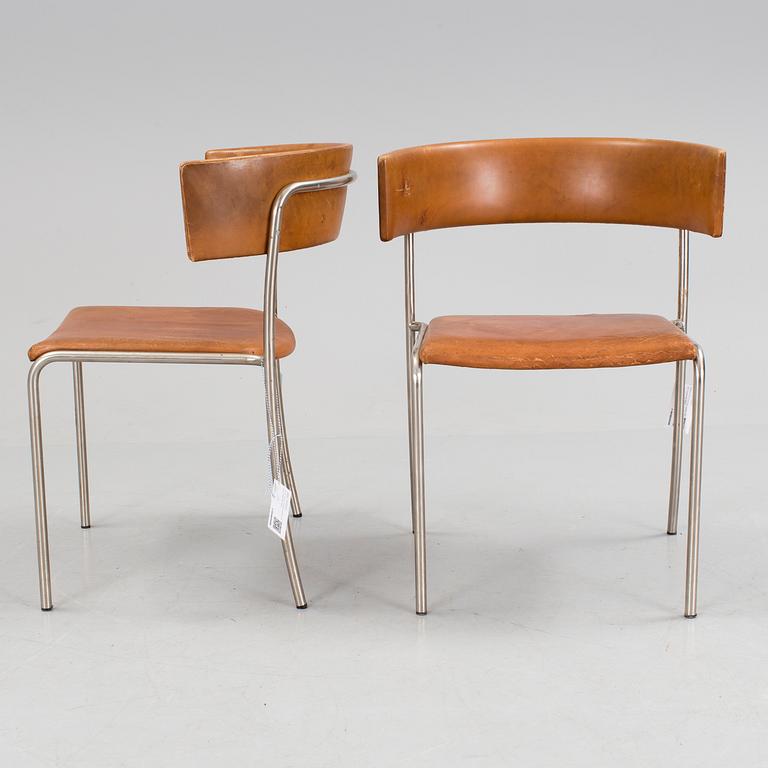 A pair of Erik Karlström leather upholstry chairs, circa 1965.