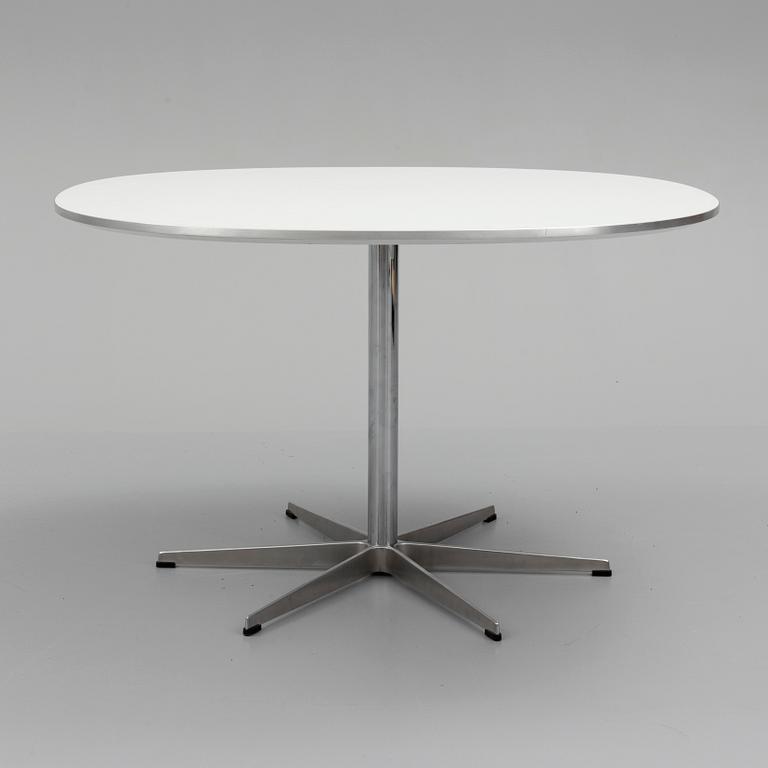 A 1990 'Supercirkulär' table by Bruno Mathsson & Piet Hein, Fritz Hansen, Denmark.