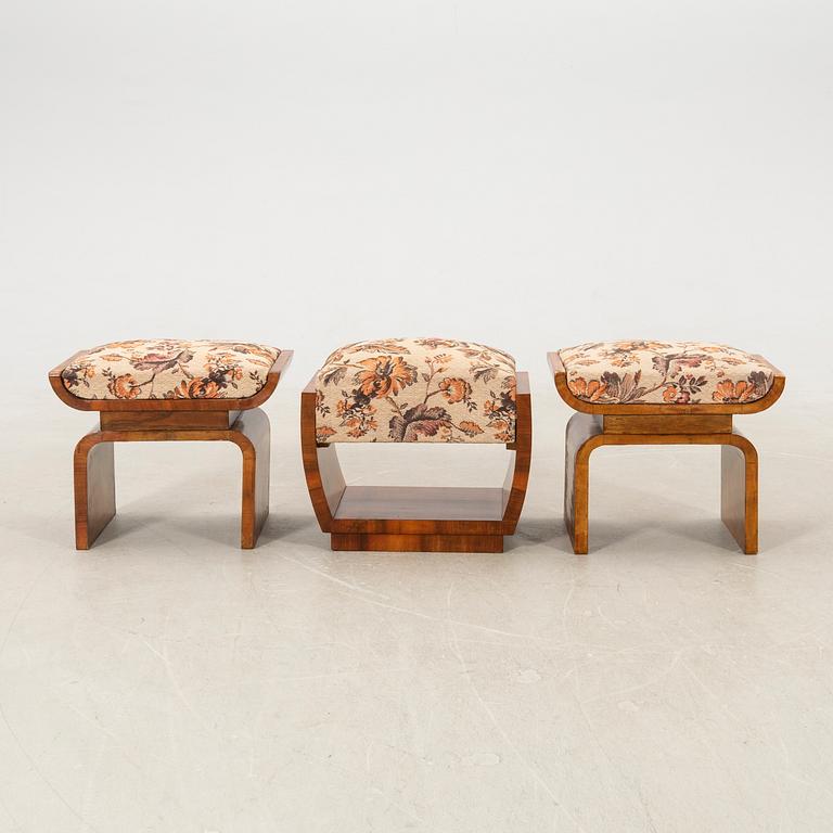 A pair of stools and an Art Deco from the first half of the 20th century.