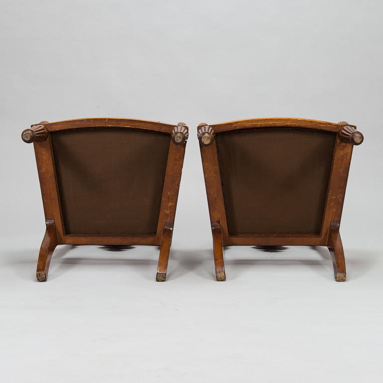 A pair of Baltic open armchairs from around 1820.