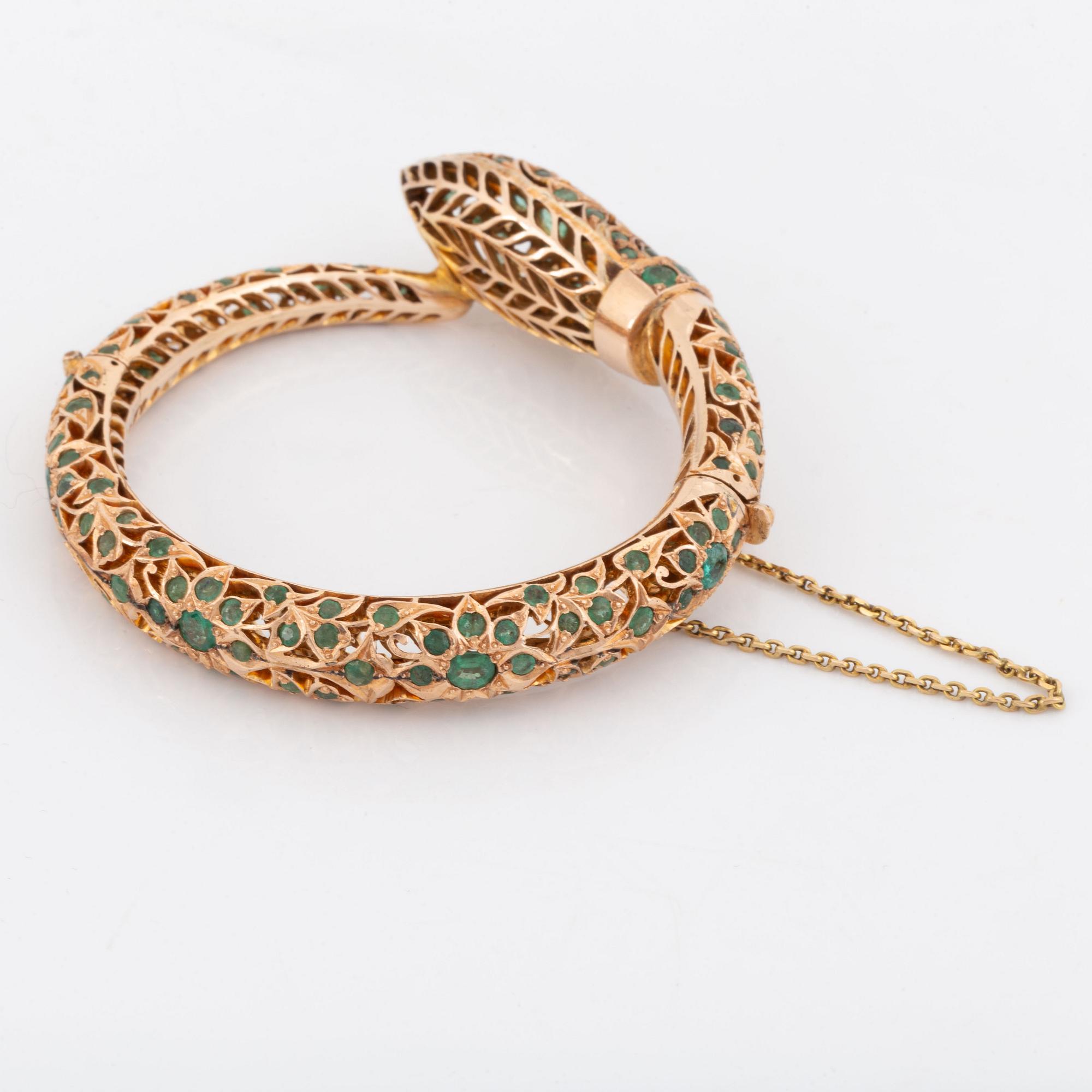 Armring,  i form av orm 14K guld med smaragder.