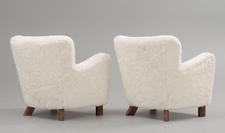 A pair of Fritz Hansen 'Model 1669' armchairs, Denmark.