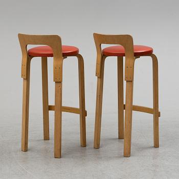 ALVAR AALTO, a pair of birch bar stools from Artek, Finland,