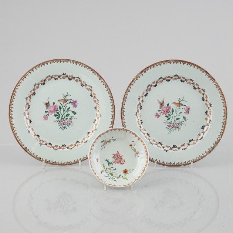 A pair of porcelain plates and a saucer, China, Qianlong (1736-95).