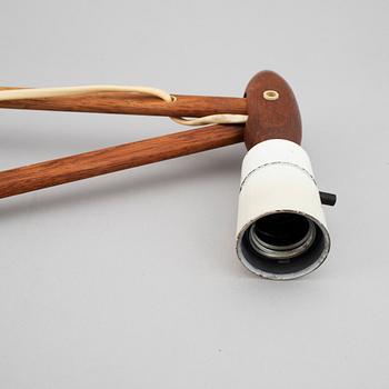 Two Le klint wooden wall lamps.