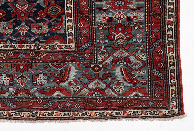 A Malayer runner, west Persia, c. 560 x 200 cm.