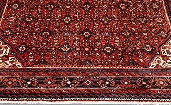 A carpet, Hosseinabad, approx. 320 x 210 cm.