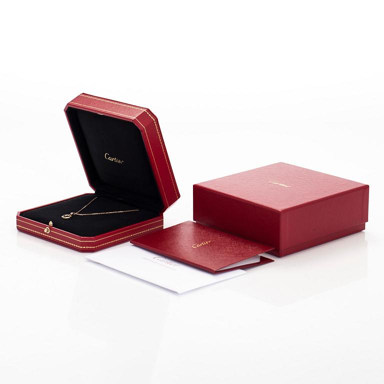 Cartier, an 18K gold 'Trinity Pendant' necklace with a brilliant-cut diamond.