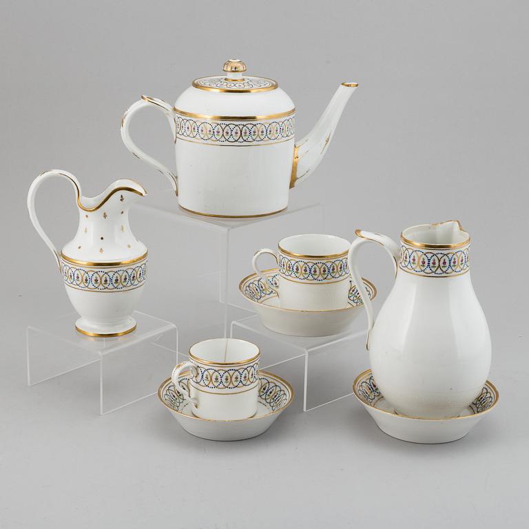 A tete a tete service, Empire, 19th Century. (5 pieces).