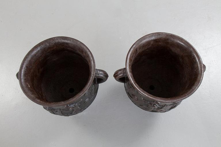 Ivar Johnsson, a pair of Swedish Grace cast iron jardinières, 'Diana' by Näfveqvarn, Sweden 1920's.