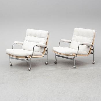 BRUNO MATHSSON, a pair of 'Karin' easy chairs, late 20th Century.