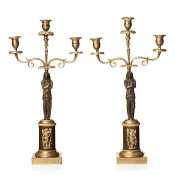 110. A pair of late Gustavian circa 1800 three-light candelabra.