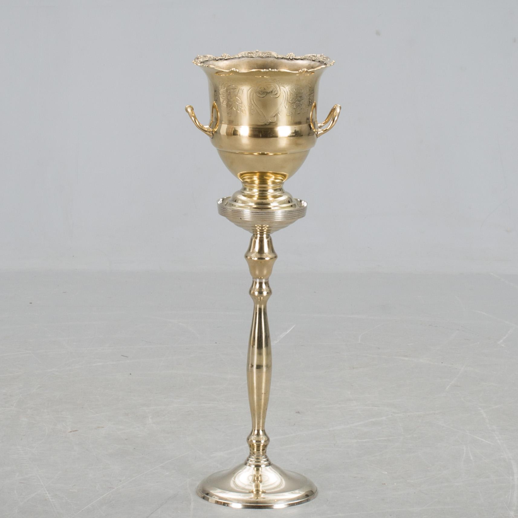 CHAMPAGNEKYLARE på FOT, metall, 1900-tal.
