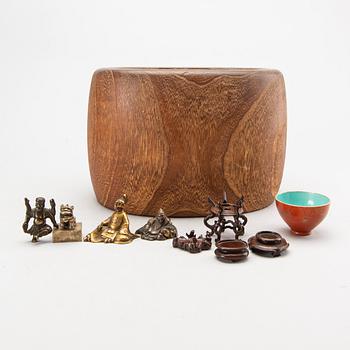 A set of four bronze giurines, a wooden bowl, two stands and one porcelain cup with stand, 20th century.