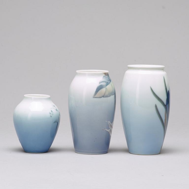 BING & GRÖNDAHL and ROYAL COPENHAGEN, a set of three porcelain vases and a dish, Denmark.