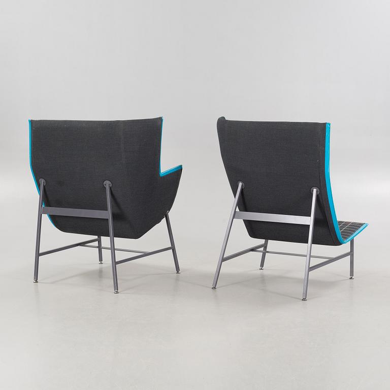 A pair of 21st century "Paper Planes" armchairs by Nipa Doshi and Jonathan Levien for Moroso.